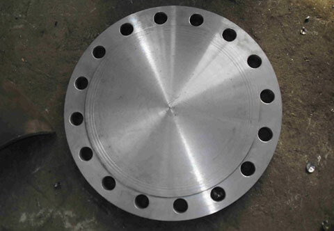 A stainless steel flange with holes